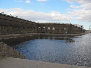 Landscape with an old fortress wall and a river