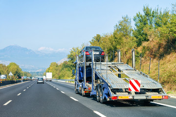 Car carrier truck on road