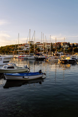 Fototapeta na wymiar Marina with boats in Adriatic Sea in Pula Croatia sunset