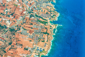 A small resort town in the north of Cyprus. View from the plane.