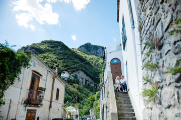 Young smiling tender romantic couple in Positano, Italy