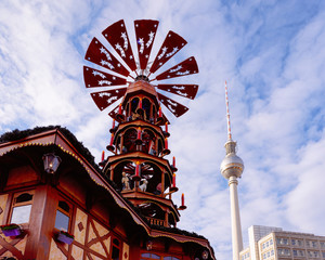 Fernsehturm and Christmas Carousel on Christmas Market Alexanderplatz Berlin