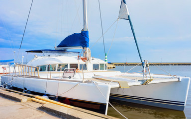 Catamaran ship in Nida resort Curonian Spit in Baltic Sea