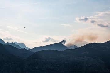 Burning forest in Italian mountains in Brescia province.