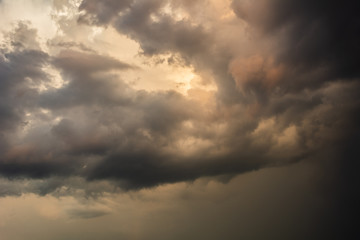 Clouds, gloomy clouds after the rain at sunset