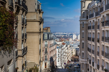 The steep pedestrian streets of the famous Montmartre neighborhood in Paris