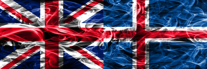 United Kingdom vs Iceland smoke flags placed side by side. Thick colored silky smoke flags of Great Britain and Iceland