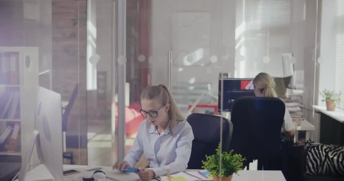 Girl manager makes a purchase in an online store