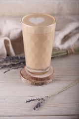 Coffee with lavender in a high glass cup