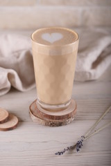 Coffee with lavender in a high glass cup