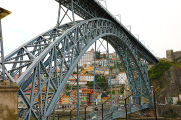 View of the historic famous bridge Dom Luiz I of Porto, Portugal. Low Angle.