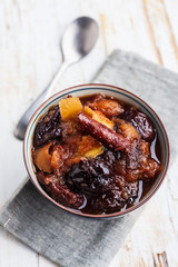 Plums and apples cooked with lemon and cinnamon