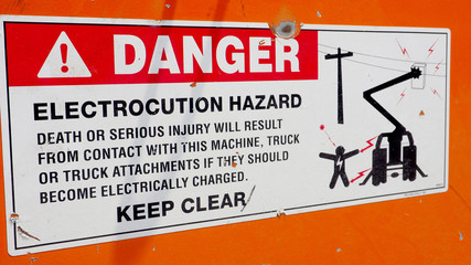 Danger sticker on electrocution hazard machine