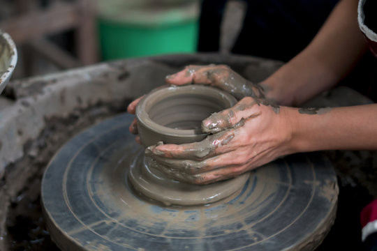 Professional Thai Old Man Using Mechanic Pottery Made Earthenware From Thailand.