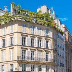 Fototapeta premium Paris, beautiful apartments with flowery balconies, typical parisian place in Saint-Germain-des-Pres 