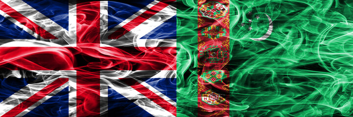 United Kingdom vs Turkmenistan smoke flags placed side by side. Thick colored silky smoke flags of Great Britain and Turkmenistan