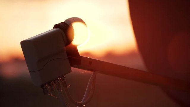 Rooftop Dish with a sunset