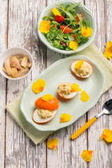 curcuma stuffed egg with mixed salad