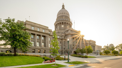 Capital building with a sun start in the morning lights in summer
