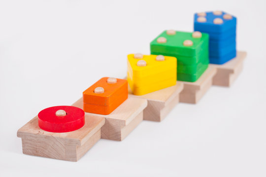 Wooden baby blocks on a white background