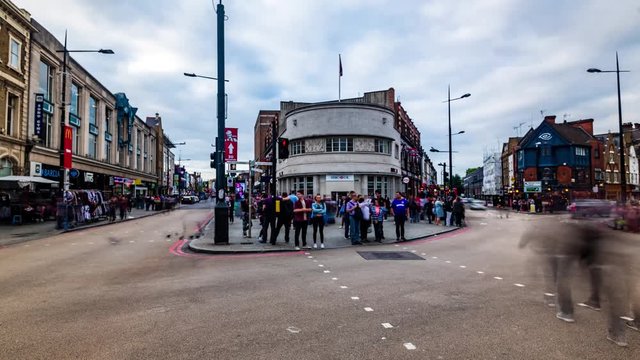 Timelapse view of a busy crossroad at a traffic lightat Camden Town in London