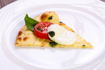 Pizza Caprese with basil