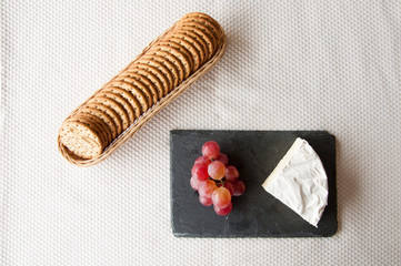 Cheese and grapes witch crackers 