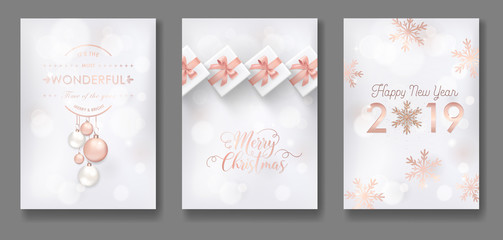 Fototapeta na wymiar Set of Elegant Merry Christmas and New Year 2019 Cards with Shining Rose Gold Glitter Christmas Balls, Stars, Snowflakes for greetings, invitation, flyer, brochure, cover in vector