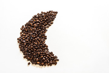 Roasted coffee beans image on white background, with space for text. Check my profile for similar images.