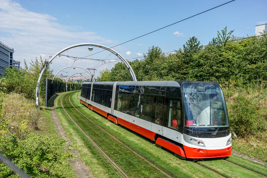 Modern tram in front of a stop in Prague