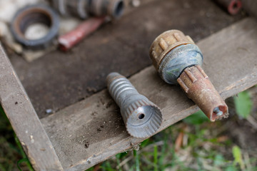 Garden sprinkler for watering vegetables and flowers. Old garden accessories.