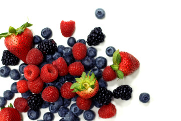 Fototapeta na wymiar fresh mix berries on a white back ground