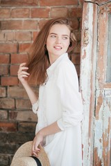 Portrait of beautiful young  woman with makeup in fashion clothes