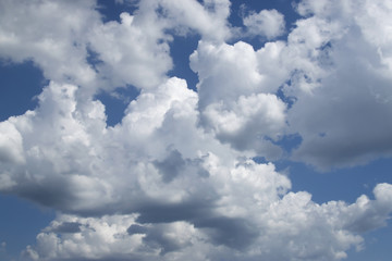  Volumetric white clouds occupy the entire blue sky
