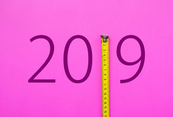 happy new year 2019. 2019 with Meter measurement,  carpentry tape meter