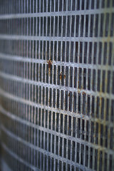 Metal cage texture with different layers. Steel sheet for background. Stock photo.