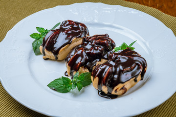 Chocolate Eclairs on a plate