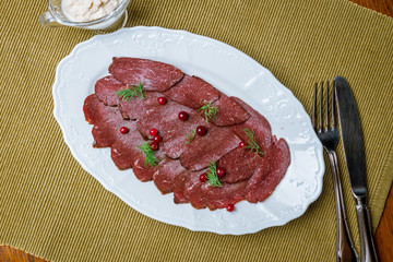 sliced dry-cured venison