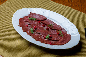 sliced dry-cured venison
