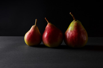 three Ripe yellow pears