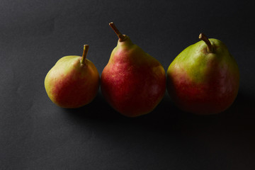 three Ripe yellow pears