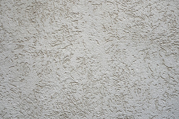 Embossed decorative plaster gray, imitation of craquelures