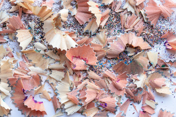 background. defocusing. sharpened pencils. colored shavings.