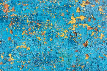 Obraz na płótnie Canvas background. original cracked plaster painted in blue and yellow colors