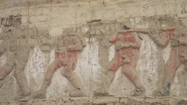 Naked prisoners and warriors on a Bas-relief pattern, PERU