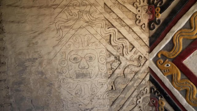 Half Reconstructed wall with the God Aiapaec of Mochica, Peru