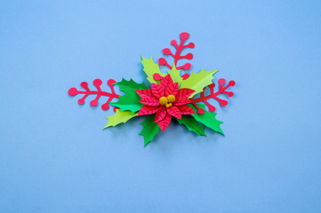 Christmas composition of paper flowers poinsettia