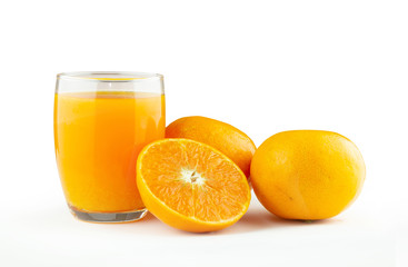 A glass of orange juice and an oranges isolated on white background 