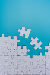 jigsaw puzzle on blue background