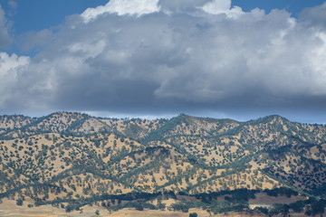 View of beautiful hills under clouds